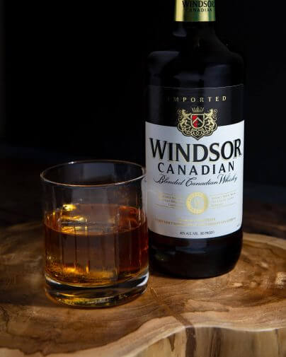 Windsor On the rocks drink with a Windsor Canadian Bottle